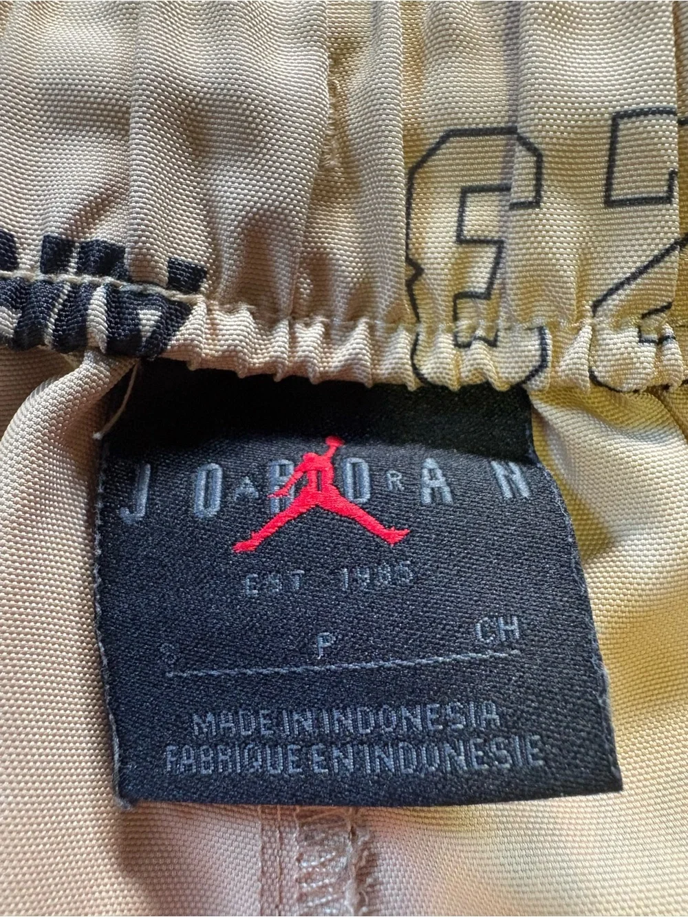Jordan Men's Tan All-Over Logo Athletic Shorts